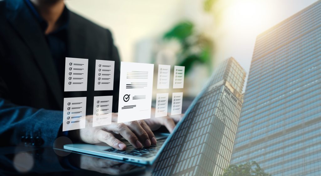 Businessman typing on laptop with virtual document checklist and report files on screen with building overlay Concept of business workflow document management and quality control audit | Quest Mindshare Padlock over survey data, representing data privacy in market research