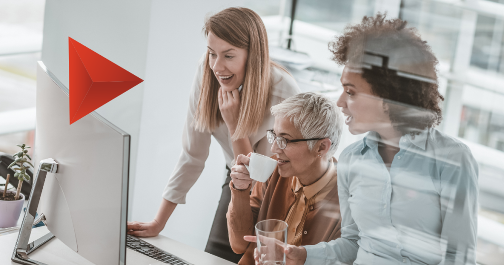Woman leading a presentation to colleagues, celebrating women in market research