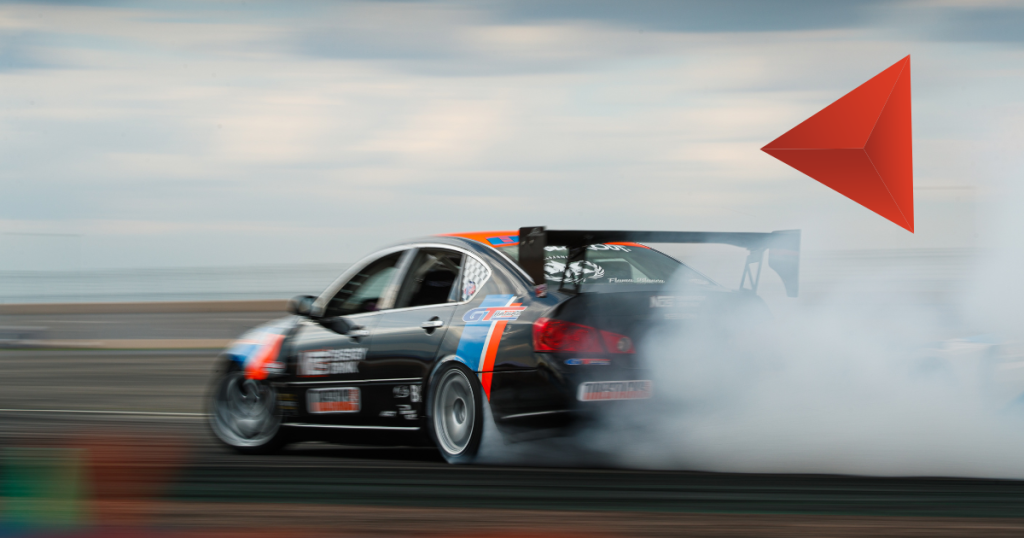 Racing pit crew changing tires in seconds, illustrating speed without sacrificing quality in market research