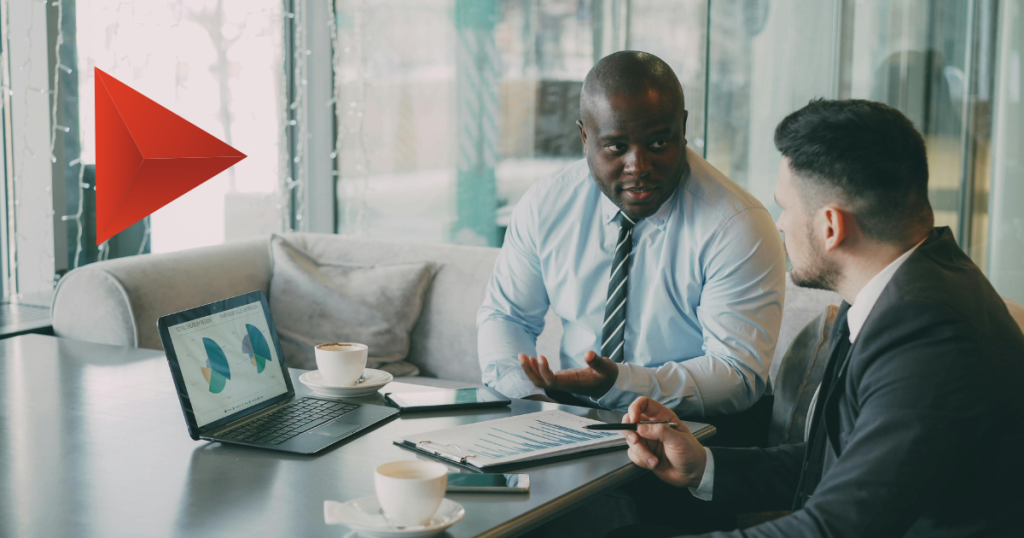 Business professional answering qualifying questions on a laptop, illustrating B2B survey screening