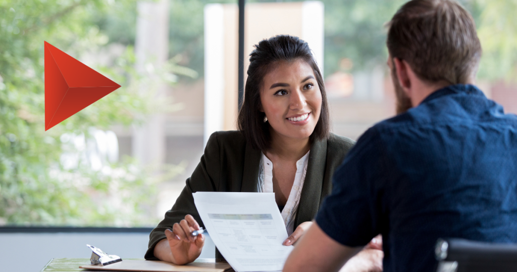 Researcher and client shaking hands after a project discussion, showing a trusted market research partner